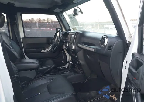 2013 Jeep Wrangler Unlimited Freedom Edition из США, поврежденный, VIN 1C4HJWDG2DL569561